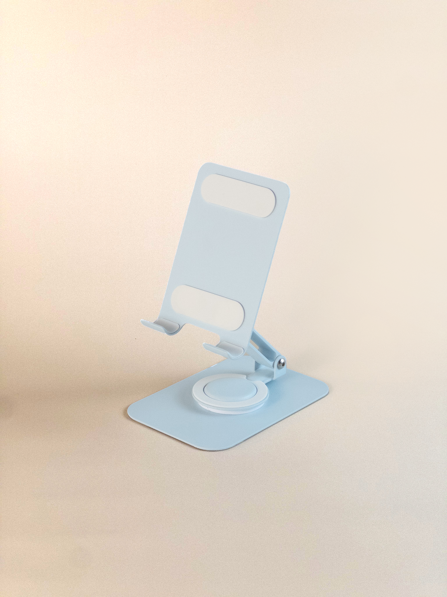 Blue phone holder on a beige background