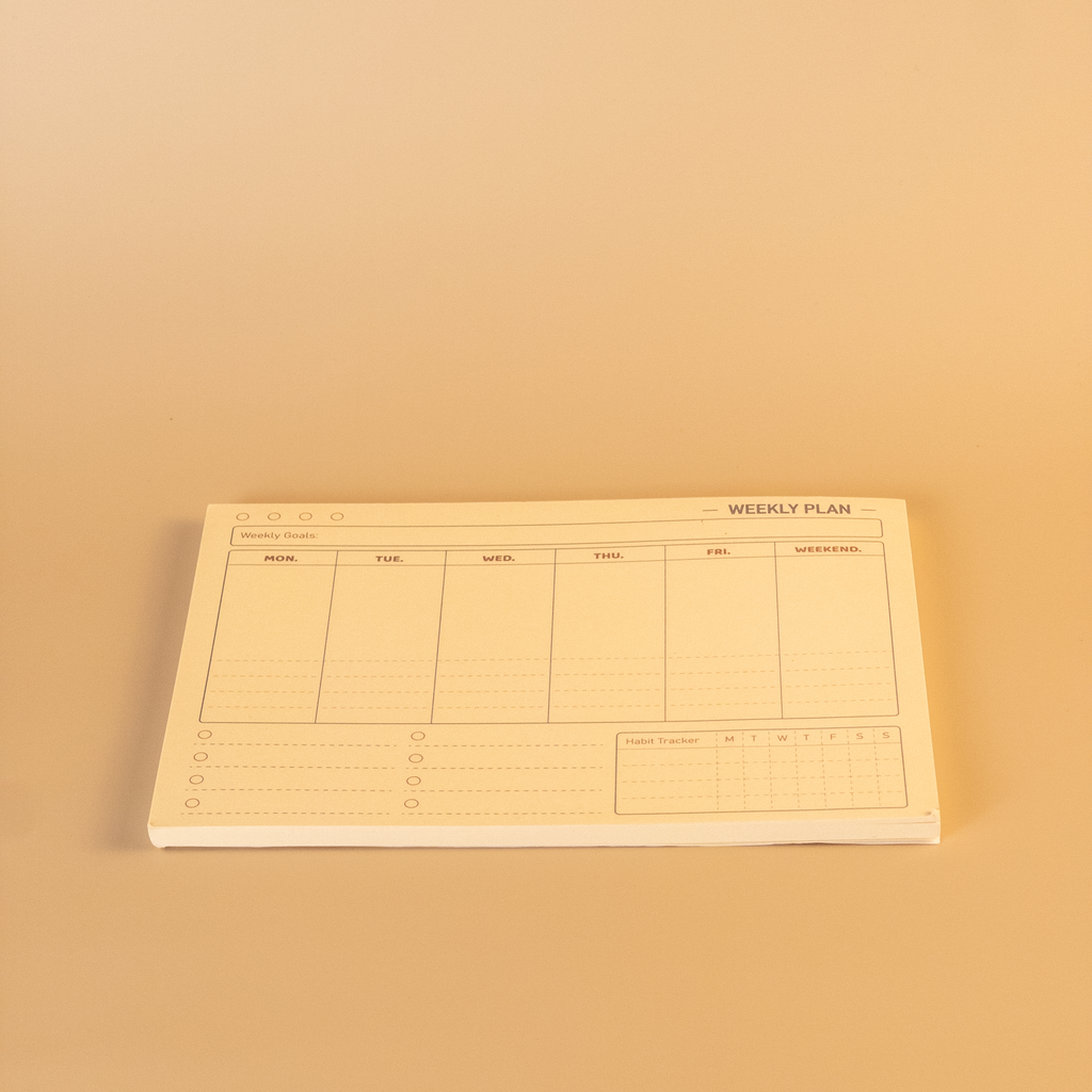 Weekly plan sheet on a beige background