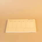 Weekly plan sheet on a beige background
