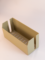Beige metal tool holder on a white background
