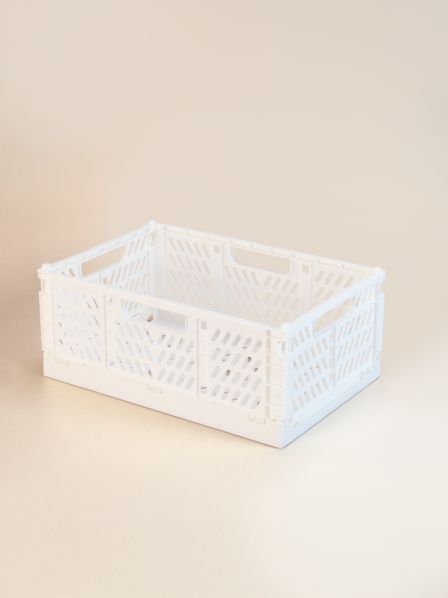 White storage crate on a beige background