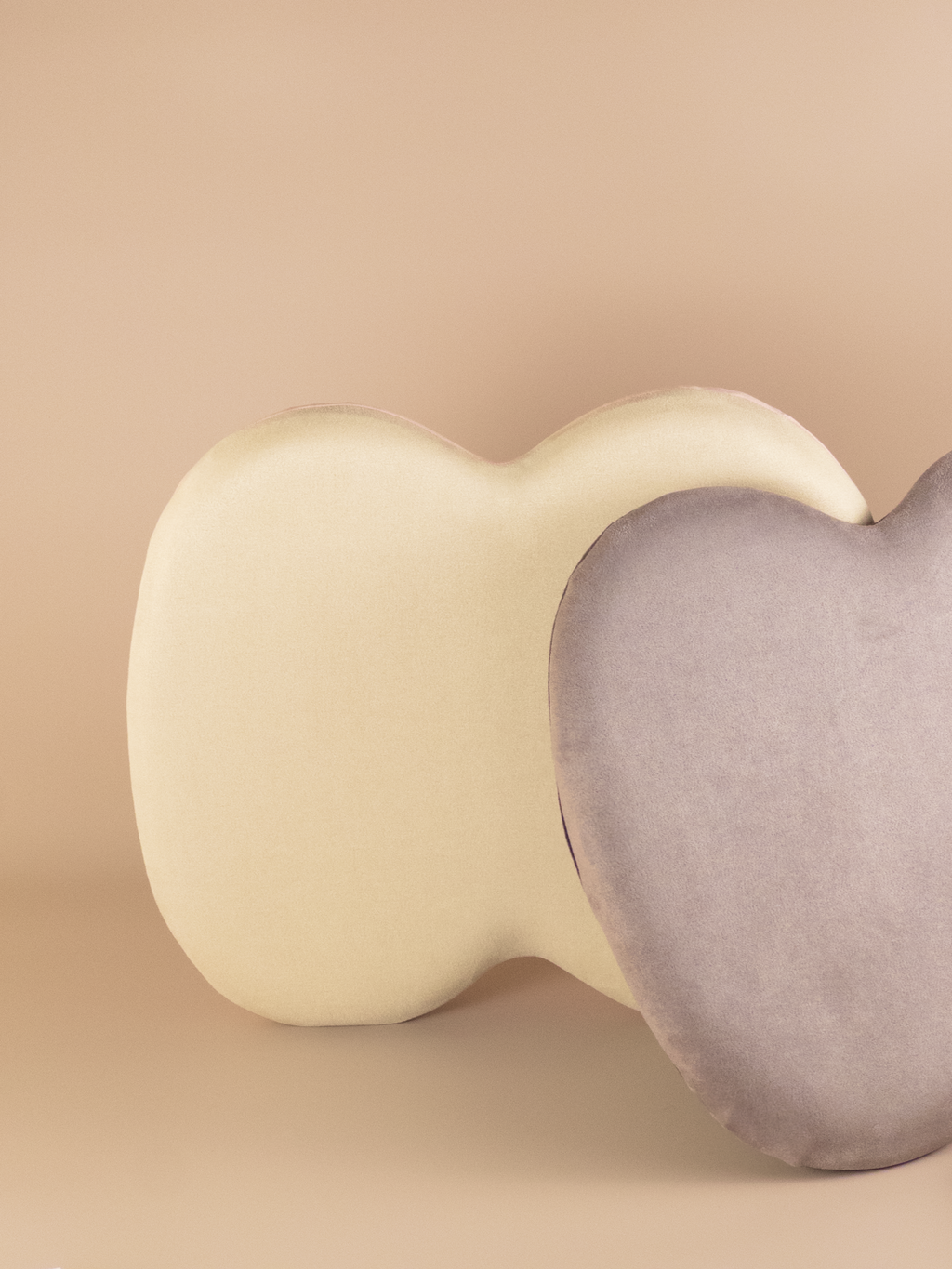 Close-up of the cushion’s underside showing the soft fleece non-slip surface that keeps it stable on the chair.