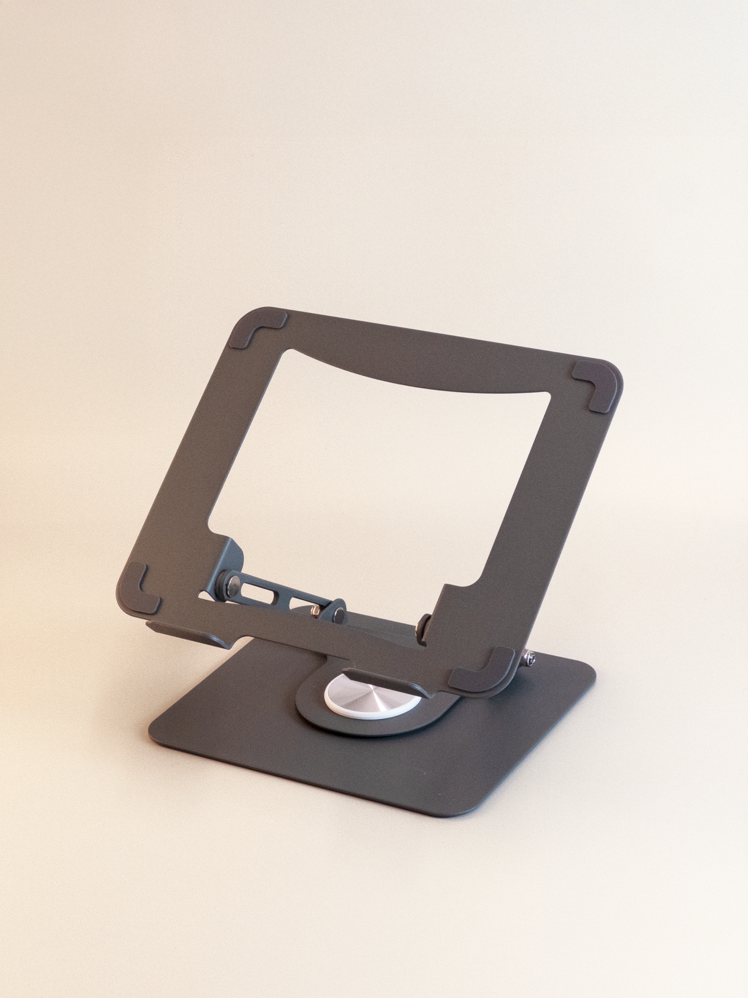 Gray adjustable stand on a light gray background