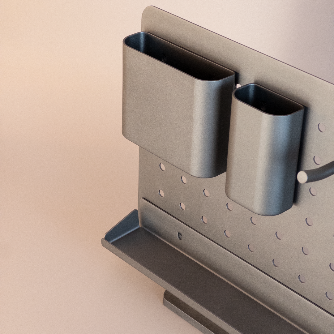 Two gray metal containers attached to a pegboard wall.