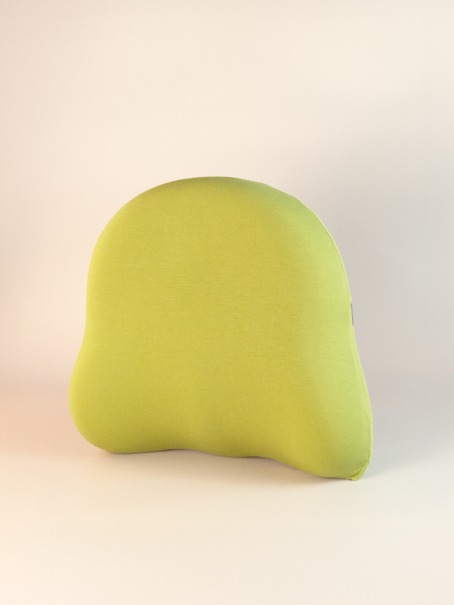 Green lumbar cushion on a beige background