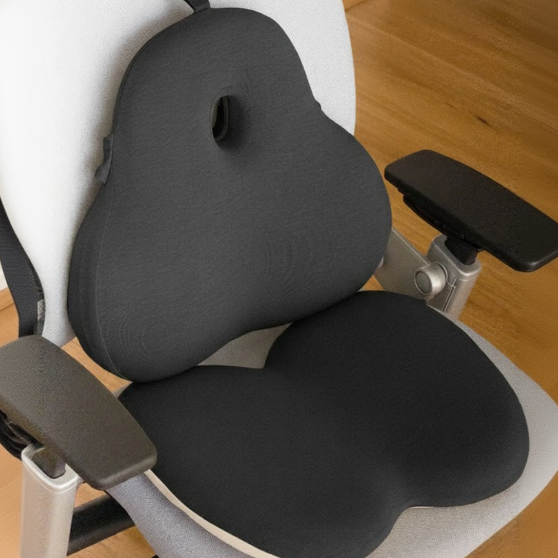 Ergonomic chair with a black cushion on a wooden floor