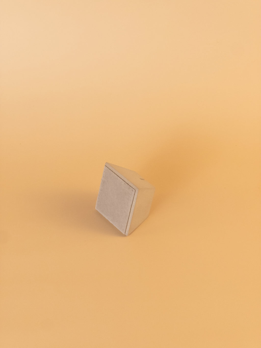 Concrete note holder base showing sturdy minimalist design