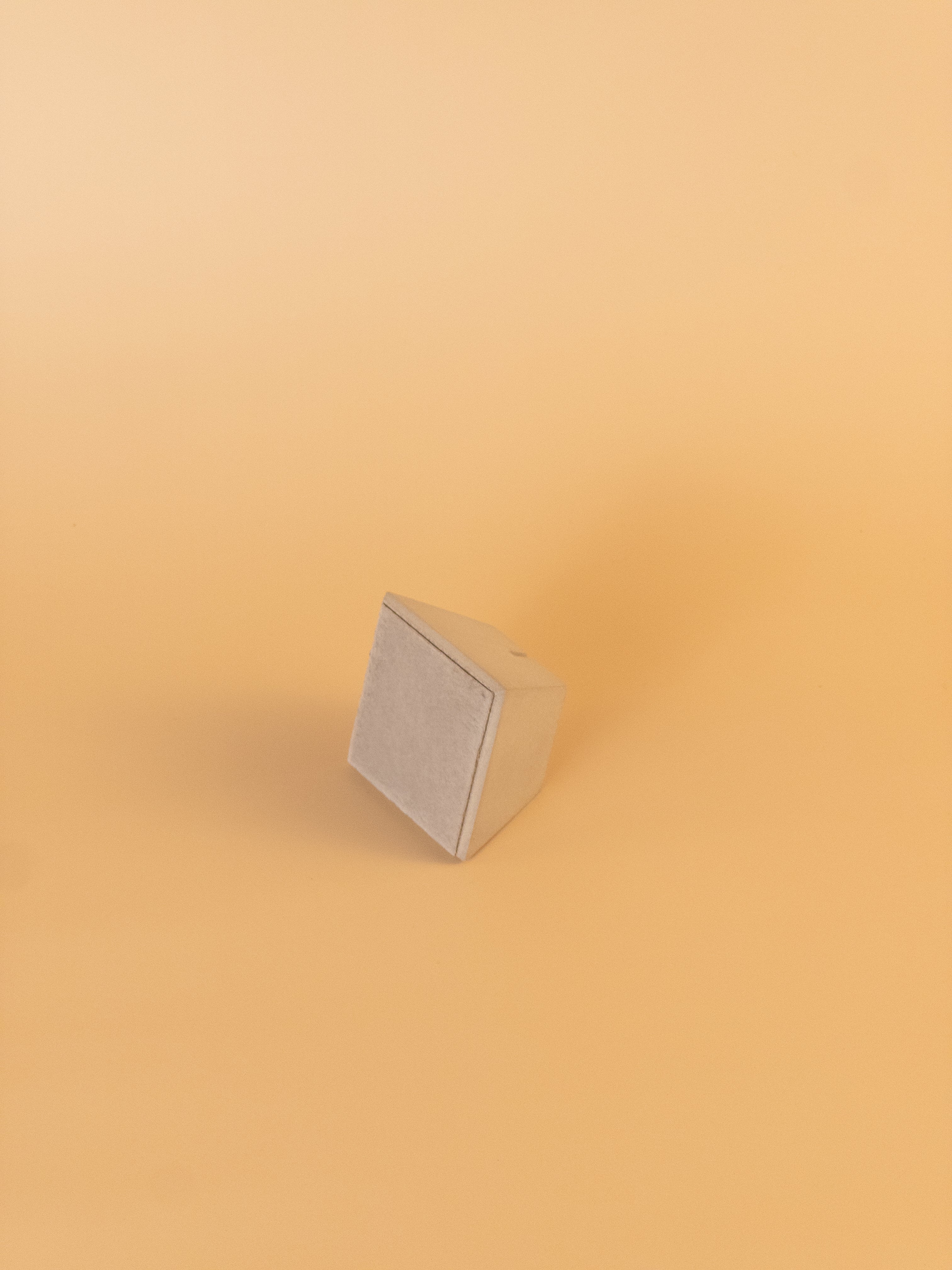 Concrete note holder base showing sturdy minimalist design