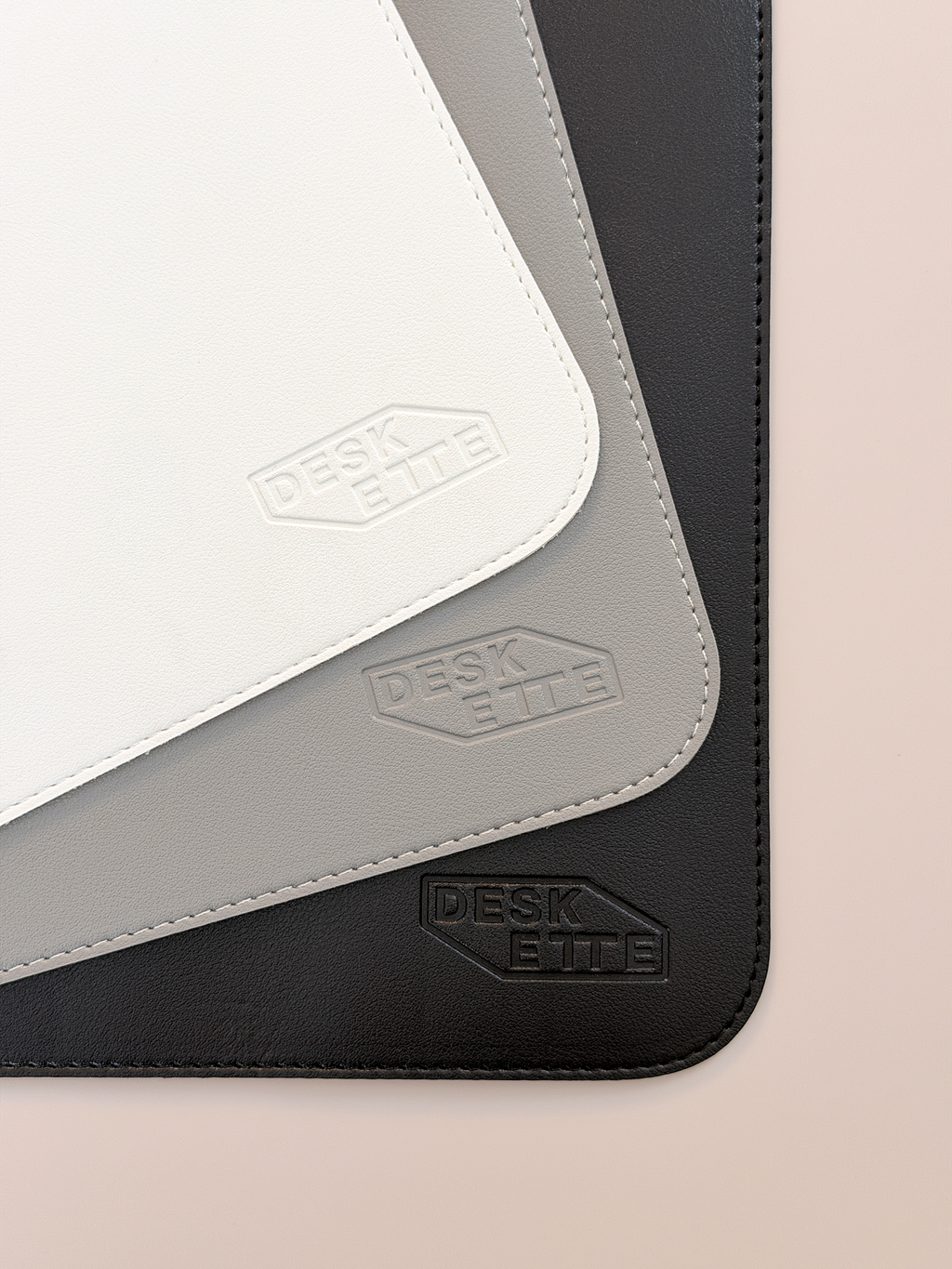 Black, gray, and white mouse pad close up look