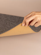 felt and cork desk mat showing natural cork backside, flexible and durable design