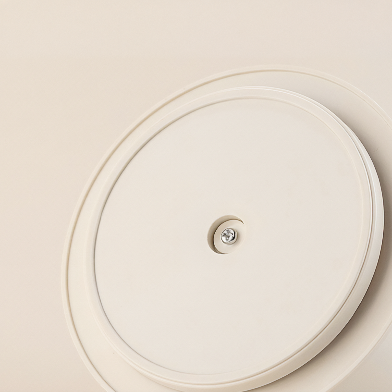 bottom view of rotating desk organiser showing stable swivel base