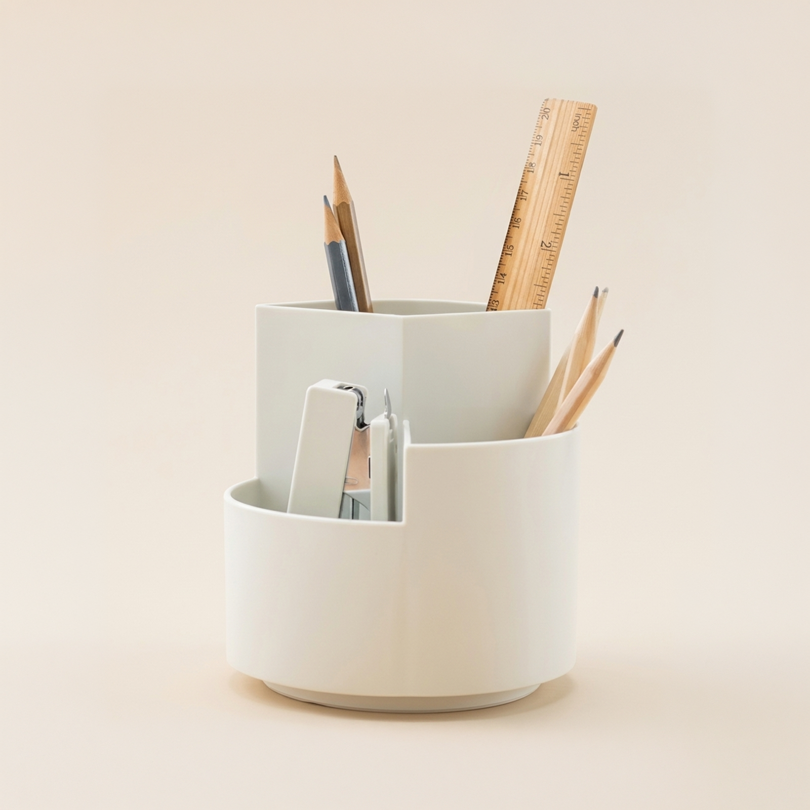 360° rotating desk organiser with pens, pencils and ruler in use