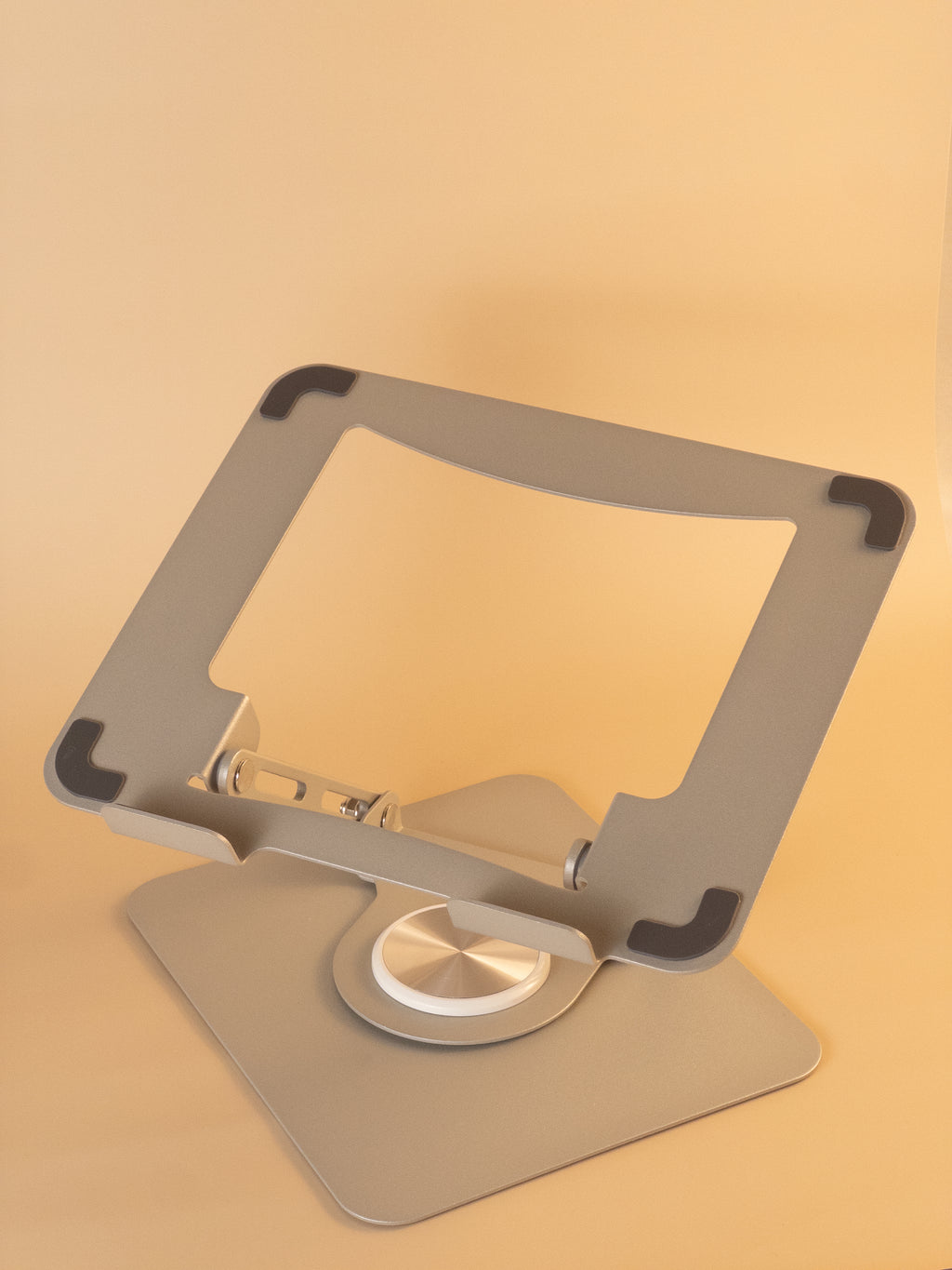 laptop stand on a beige background
