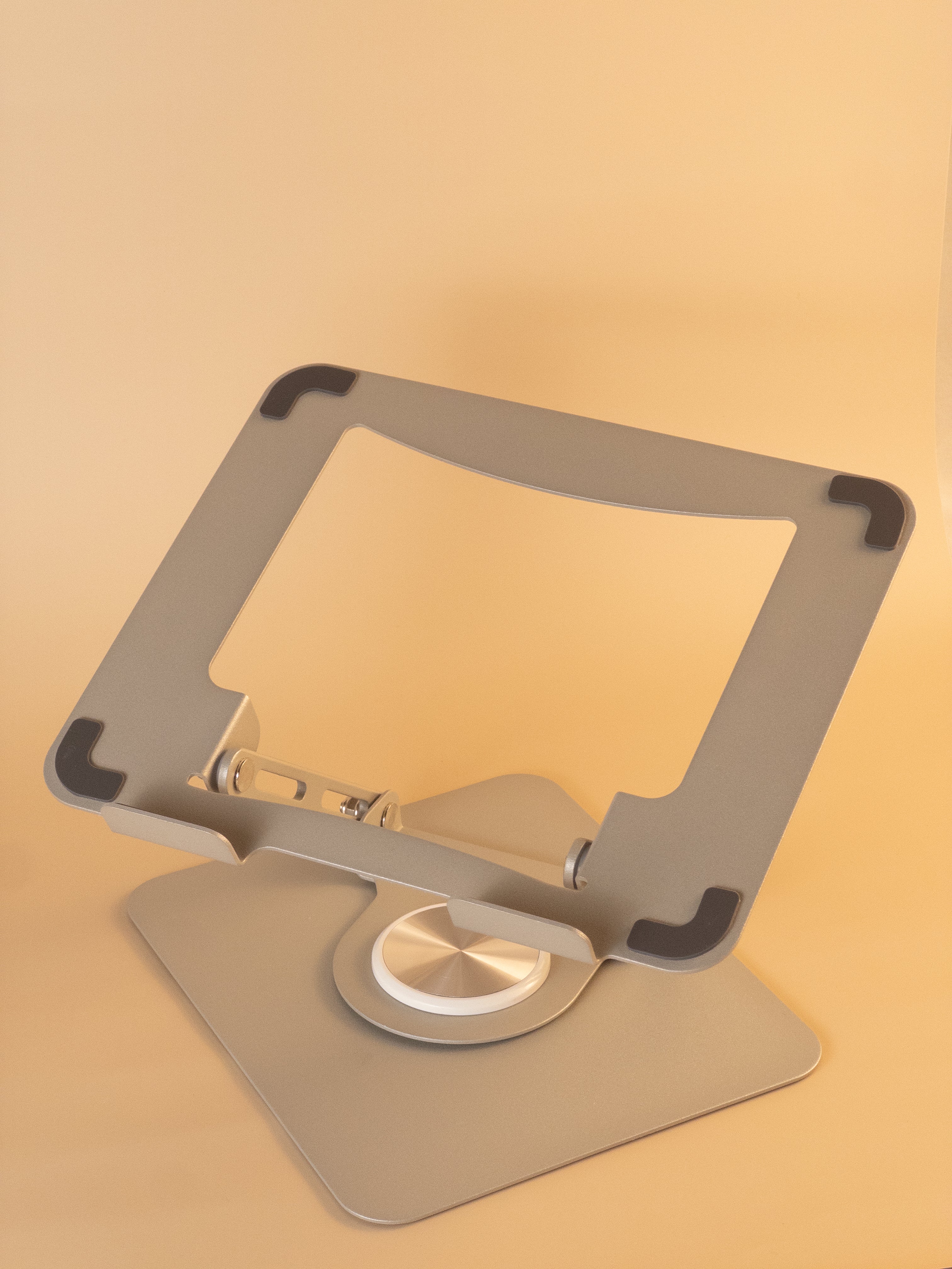laptop stand on a beige background