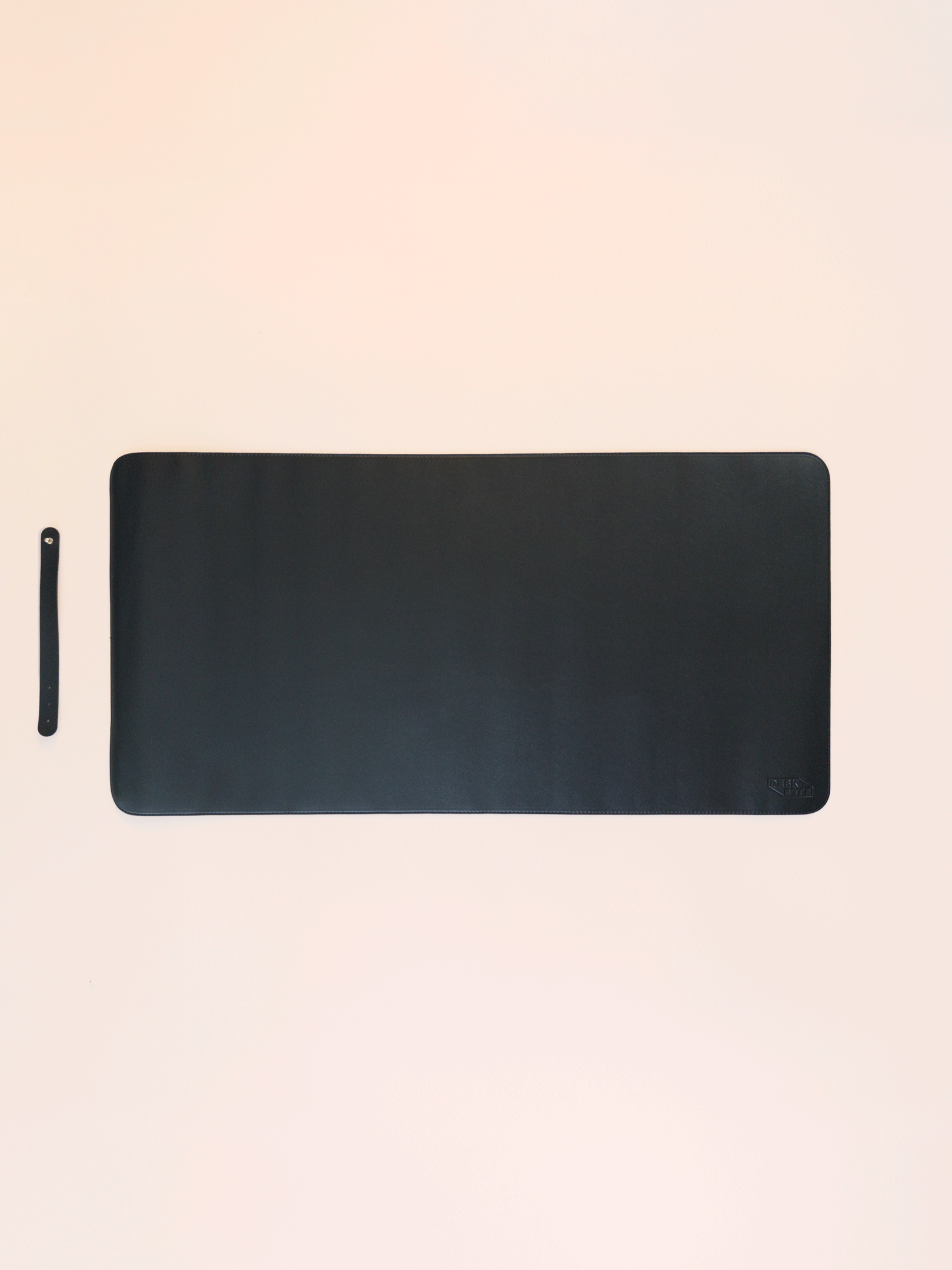 Slim black leather desk mat 80x40cm with strap, minimalist design for office and study