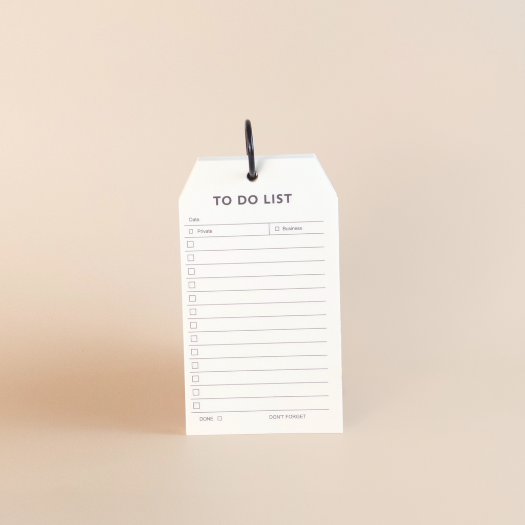 White to-do list with black text on a beige background