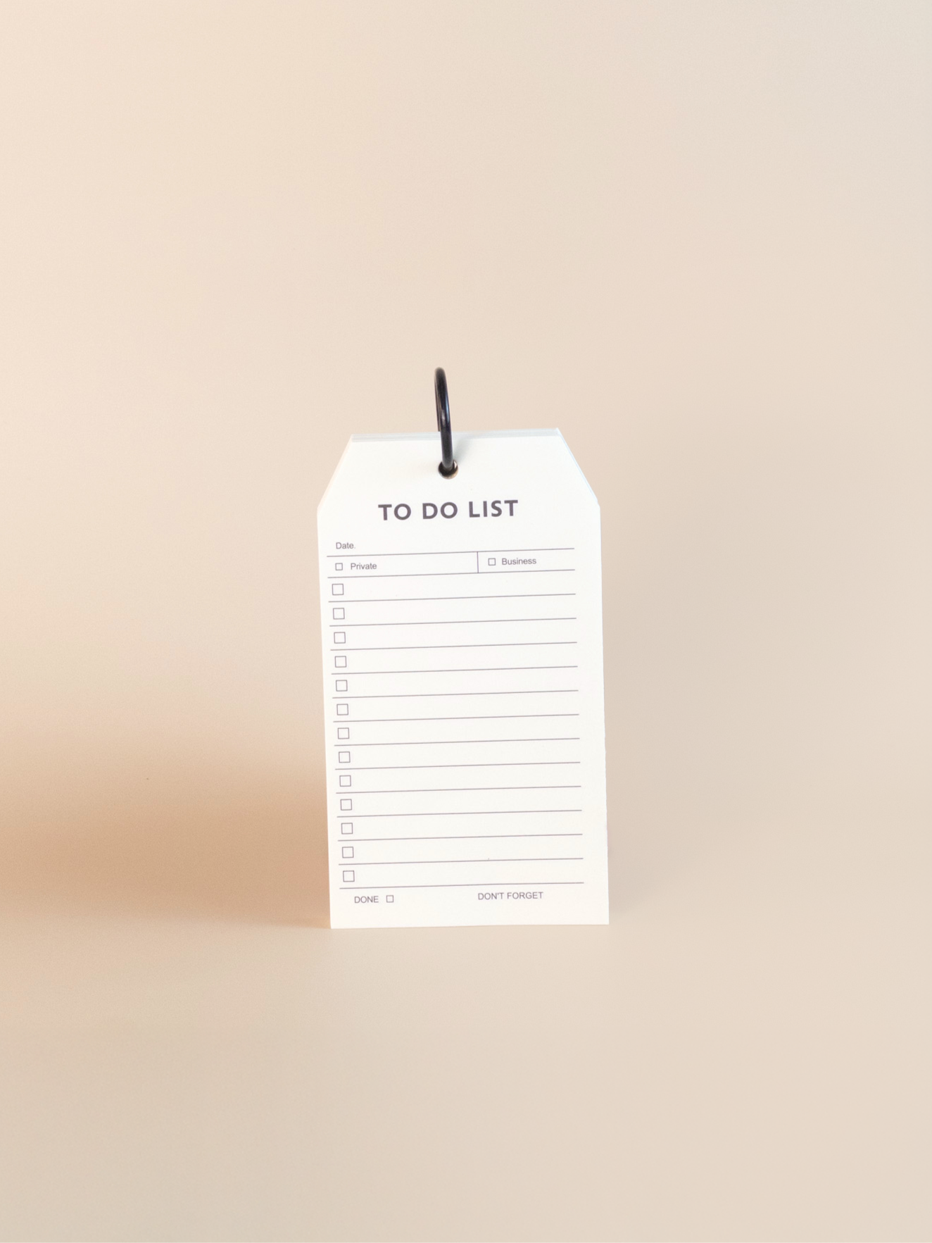 White to-do list with black text on a beige background